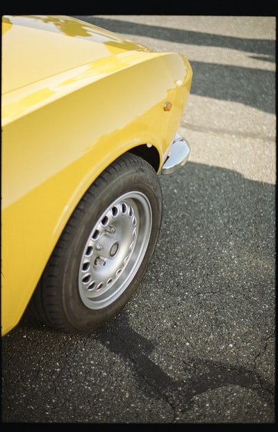 Grey yellow car wheels
